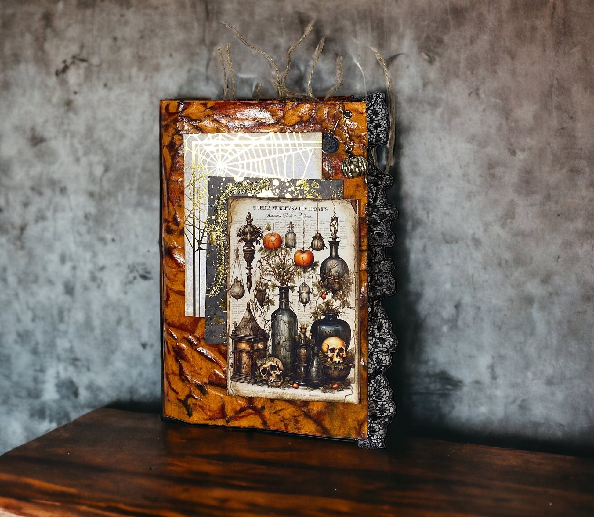 Grungy Halloween Junk Journal with skeletons, pumpkins, and potions.