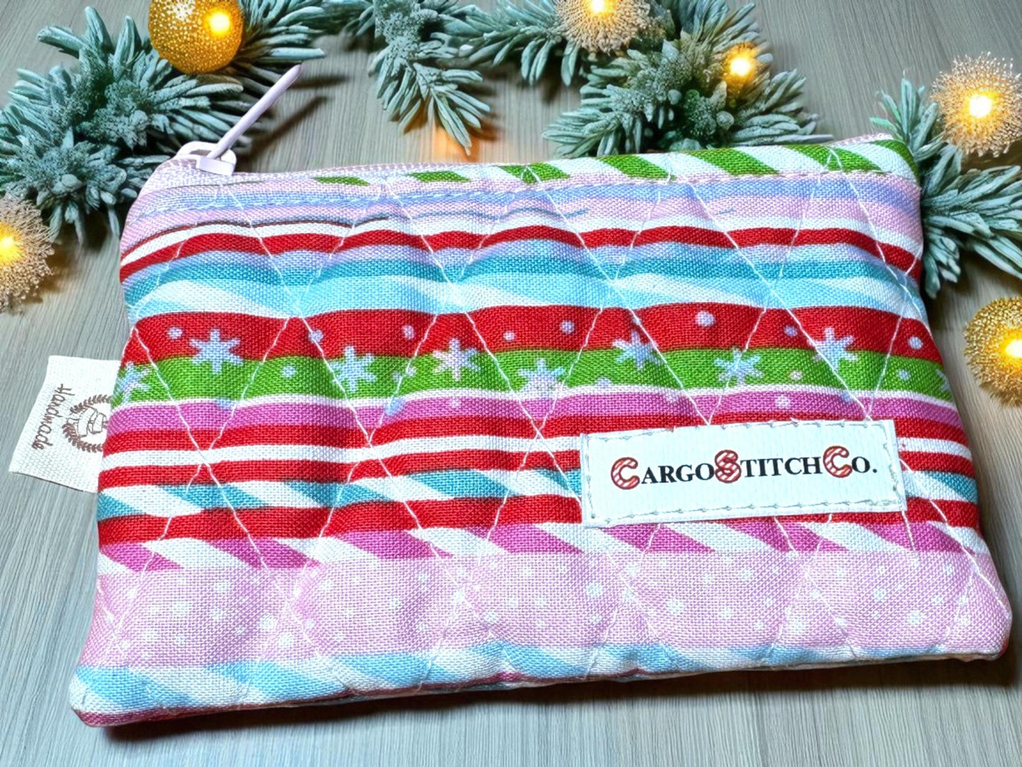 Handmade quilted 5×3 pouch with red, green and pink stripe candy-cane pattern, pink zipper closure, no pocket — Peppermint Lane Everyday design by Cargo Stitch Co.